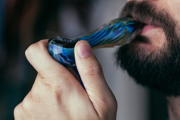 Adult Man Smoking Medical MArijuana Close Up. Selective Focus.