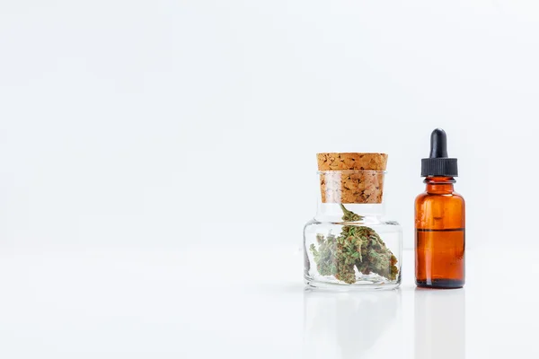 Medical Marijuana In Glass Jar Cannabis Oil Extract In Bottle Is — Stock Photo, Image