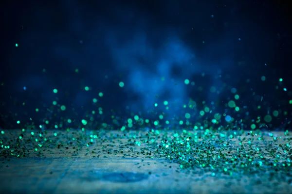 Grüne glitzernde Lichter Hintergrund. Jahrgangs-Funkel-Bokeh — Stockfoto