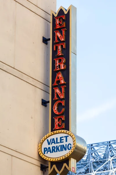 Valet Parking Entrance Sign In Urban Location.