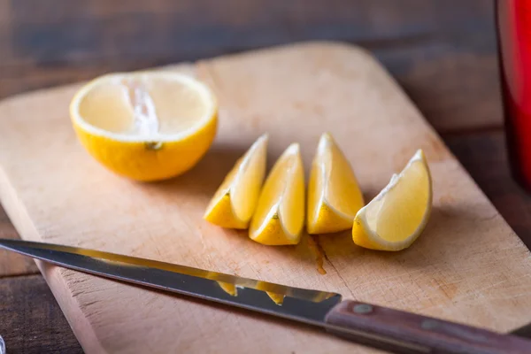 lemons cut on a cutting board