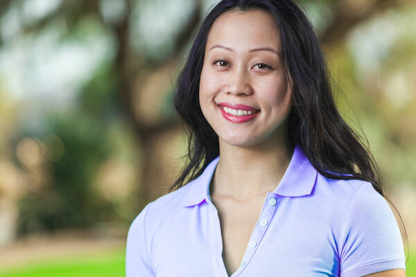 Pretty Asian Young Woman Casual Smiling In Close Up Portrait