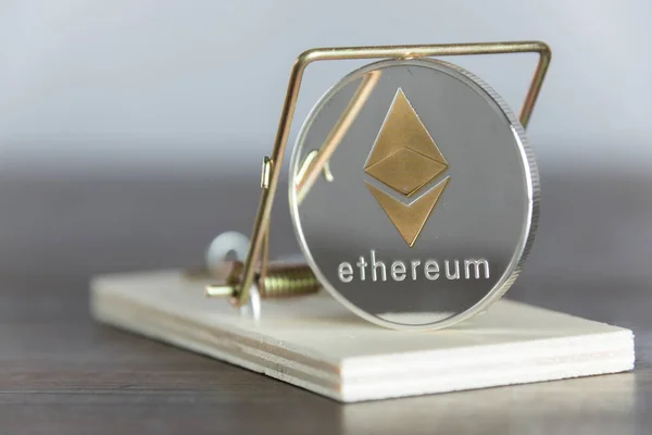 Close Up Gold Ethereum Cryptocurrency In Mouse Trap. Financial Trap. — Stock Photo, Image