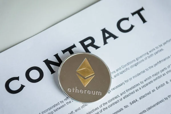 Contract payment with cryptocurrency coin ethereum. — Stock Photo, Image