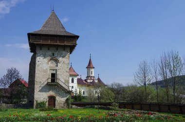 Tower from courtyard of Humor Monastery located in Gura Humorului,Romania, is one of the first of Moldavia's painted monasteries. clipart