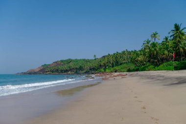 Agonda beach, Goa devlet, Hindistan yakınındaki avuç içi ile gizli Plaj Deniz Manzaralı