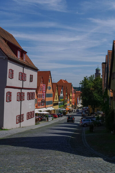 Dinkelsbuhl, Germany - August 28, 2010: Street view of Dinkelsbuhl, one of the archetypal towns on the German Romantic Road with traditional frameworks ( Fachwerk ) house.
