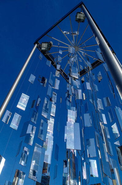 Installation in the old town celebrating 500 years of the first Christmas tree, consisting of many little mirrors.