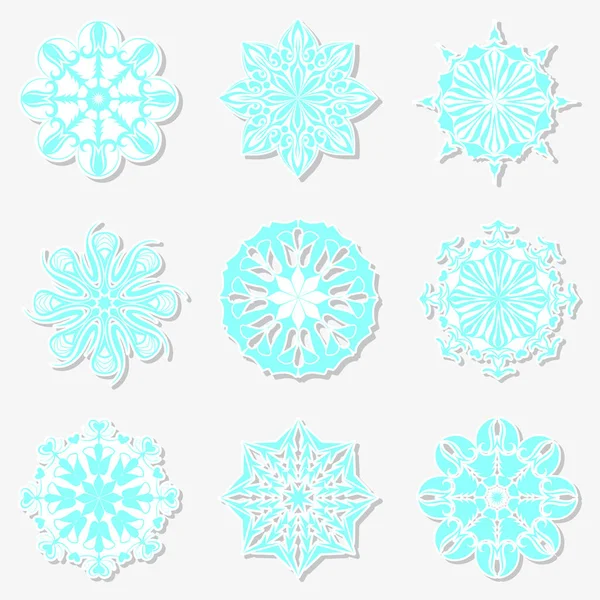 สติ๊กเกอร์เกล็ดหิมะในวันคริสต์มาสและปีใหม่ รูปแบบเวกเตอร์ — ภาพเวกเตอร์สต็อก