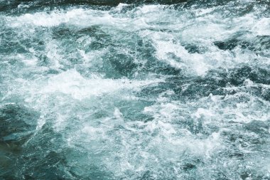 Dalga su akışı, su yüzeyi, arka plan dokusu.