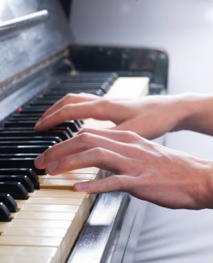 Hand playing piano clipart