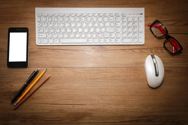 White keyboard with mouse and glasses.