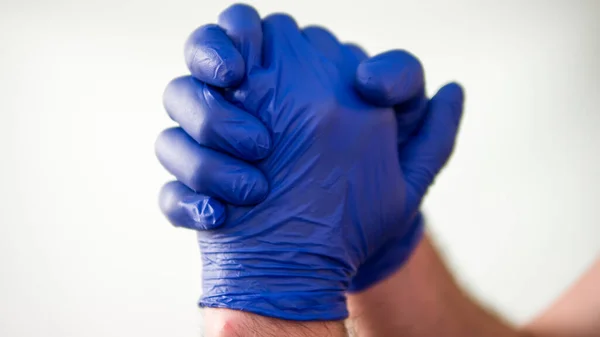Body Language Doctor Rubber Gloves Squeezes Two Hands White Background — Stock Photo, Image