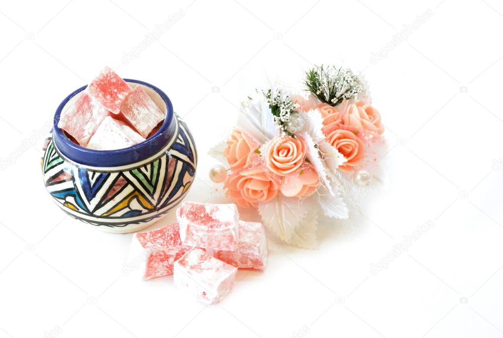 Rose flavoured Turkish delight rahat-lokum isolated on white background