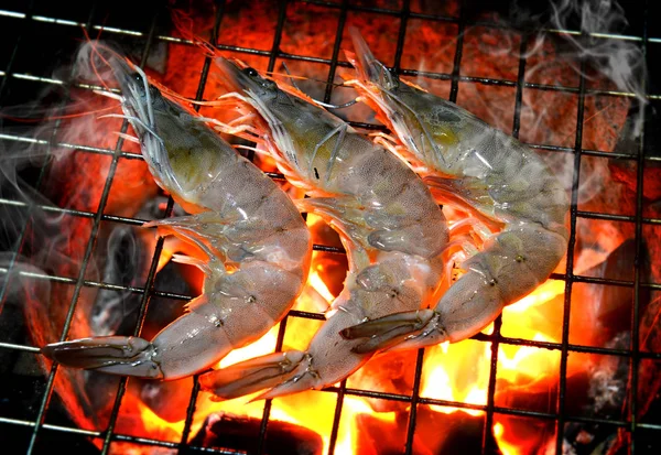 Grill Shrimp in hot fire from charcoal