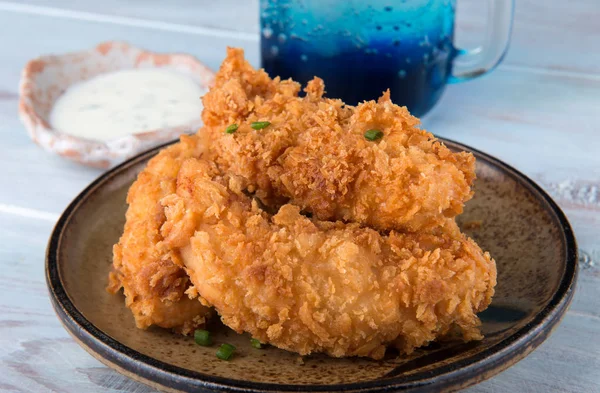 Crispy chicken tenderloid deep fried.