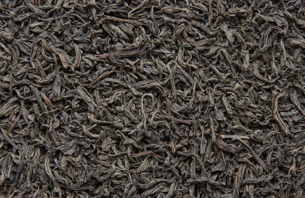 Getrocknete Schwarze Teeblätter Pflanzliche Hintergrundtextur — Stockfoto