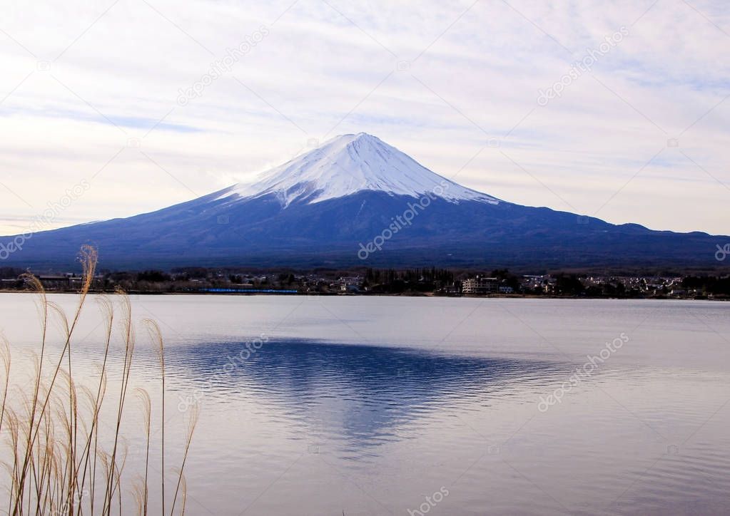 Winter landscape with Mount Fuji, forest and lake. Nature of Japan. Famous and beautiful places in the world.