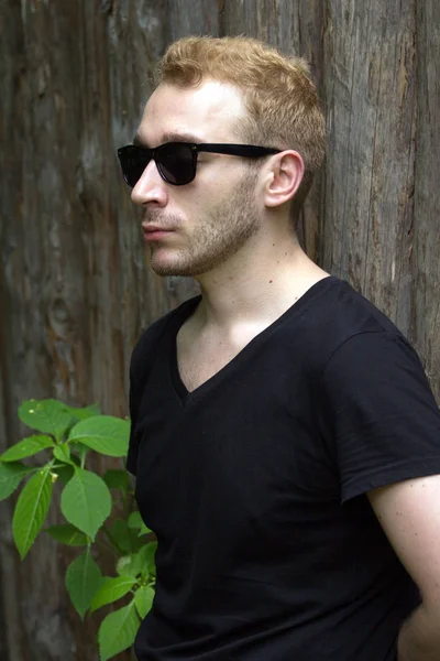 Side View Guy Sunglasses Wooden Fence — Stock Photo, Image