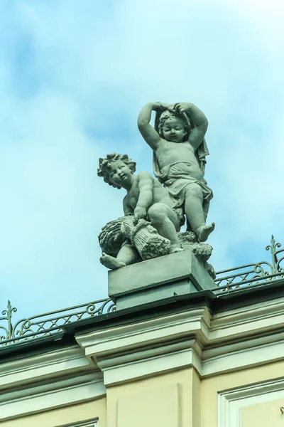 2011.05.21, Moscow, Russia. a decorative element in the form of two angels on the roof of the house.