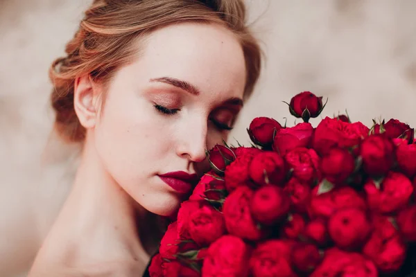 Pretty young female and flowers