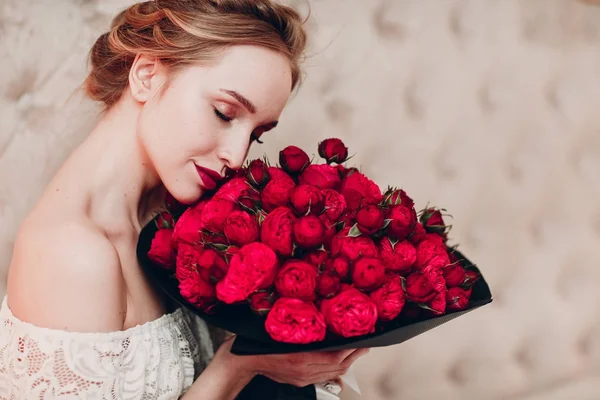 Pretty young female and flowers