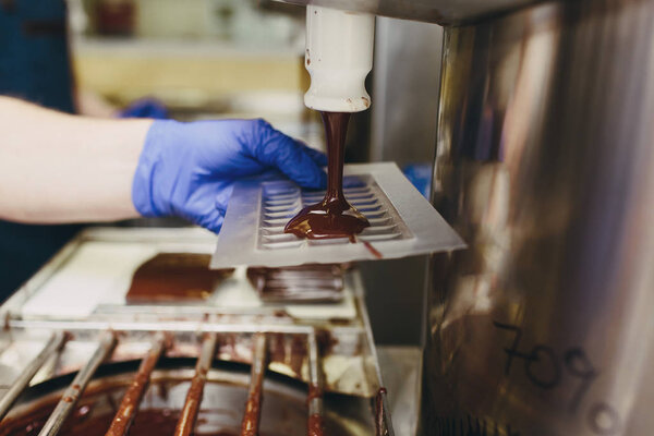 Artisan chocolate making, mold casting, tempering and molding