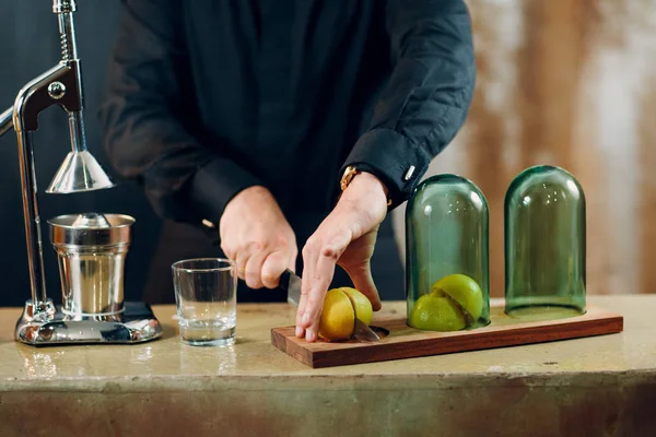 Man making freshly squeezed juice