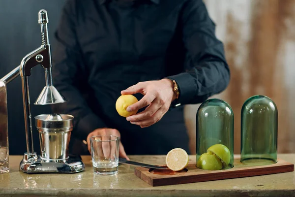 Man making freshly squeezed juice