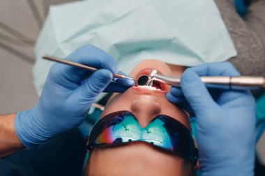 Diş hekimliği. Dişçi ve hasta. Diş Kliniği.