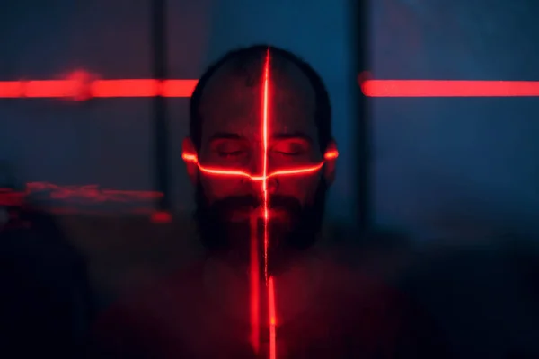Man Dark Face Illuminated Red Laser Contour — Stock Photo, Image