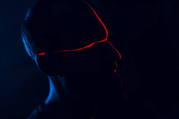Man Dark Face Illuminated Red Laser Contour — Stok Foto