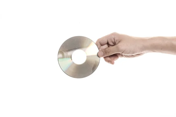 Ένα άνθρωπος χέρι κρατούν ένα cd με φορητή θήκη. — Φωτογραφία Αρχείου
