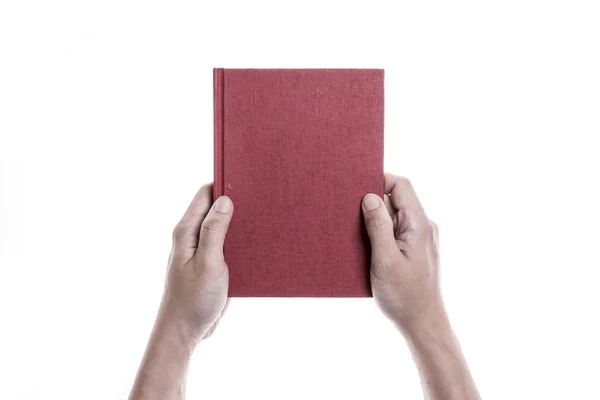 Mão segura uma capa de livro — Fotografia de Stock