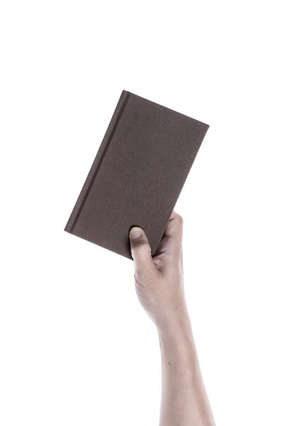 Hand houden de cover van een boek — Stockfoto