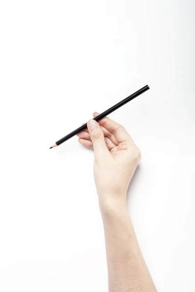 Hand som håller färgen pencil — Stockfoto