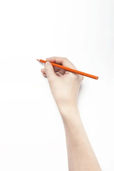 Hand som håller färgen pencil — Stockfoto