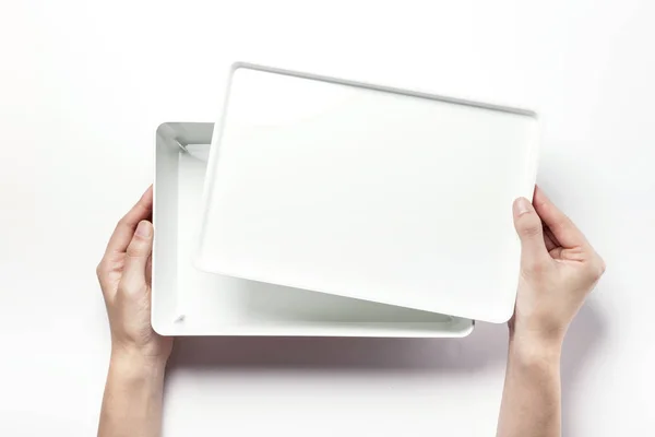 Holding a white box — Stock Photo, Image