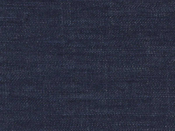 Ткань из голубой джинсы — стоковое фото