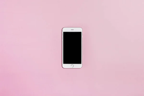 pembe bir arka plan üzerinde telefon.