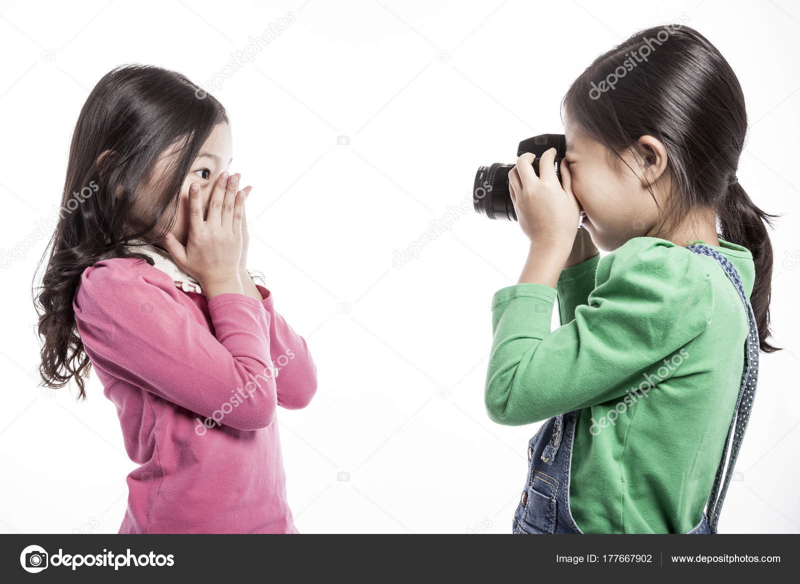 two asian girls singing Two asian girls singing