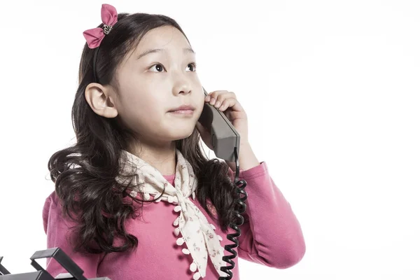 Ένα Όμορφο Κορίτσι Που Κρατά Ένα Ρετρό Τηλέφωνο — Φωτογραφία Αρχείου