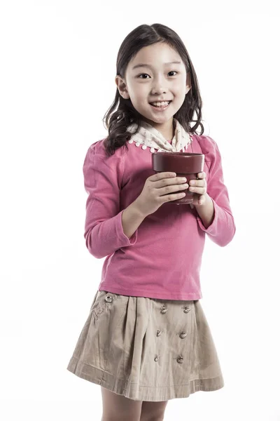 Uma Menina Segurando Pote Vestindo Uma Blusa Rosa — Fotografia de Stock