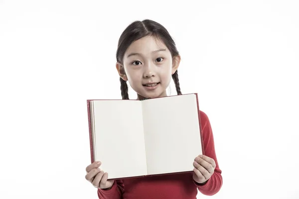 Little Girl Holding Book While Standing Studio Isolated White Background — Stock Photo, Image