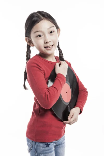 cute asian girl holding a vinyl