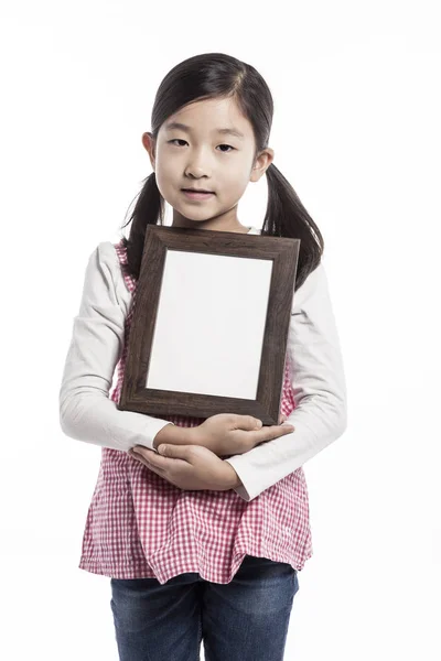 Ασιατικό Χαριτωμένο Κορίτσι Που Κρατά Ένα Ξύλινο Πλαίσιο — Φωτογραφία Αρχείου