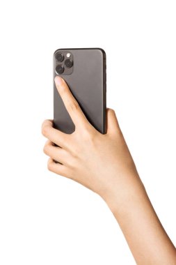 Kadın eli akıllı telefonu tutuyor, kamera tarafı beyaz..