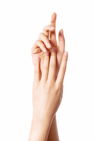 女二人の手は白い上に隔離された化粧品のために互いに触れる — ストック写真