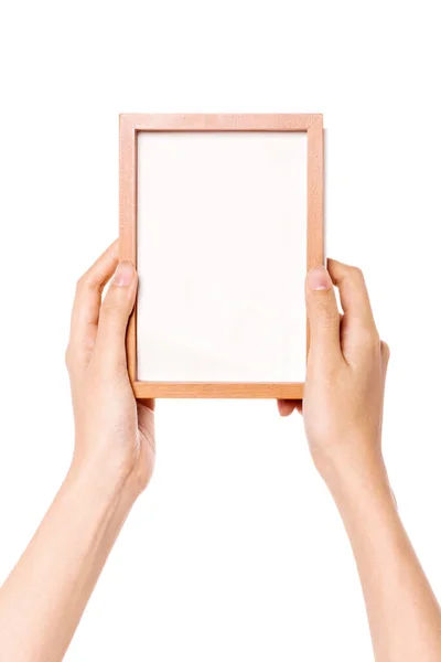 女人的手拿着一张照片 画上木框与白色隔离 — 图库照片