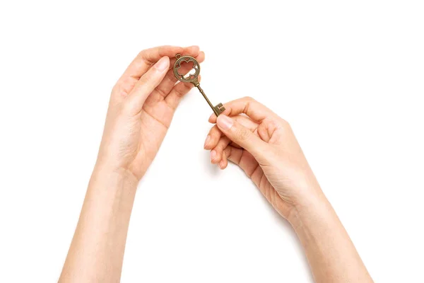 Γυναίκα Χέρι Κρατήστε Ένα Vintage Κλειδί Που Απομονώνονται Λευκό — Φωτογραφία Αρχείου